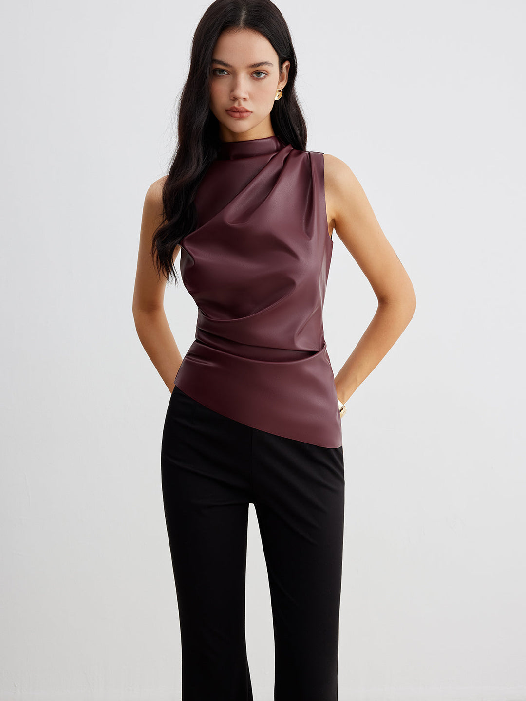 Women's sleek high neck sleeveless top in a vibrant summer color, perfect for casual outings.