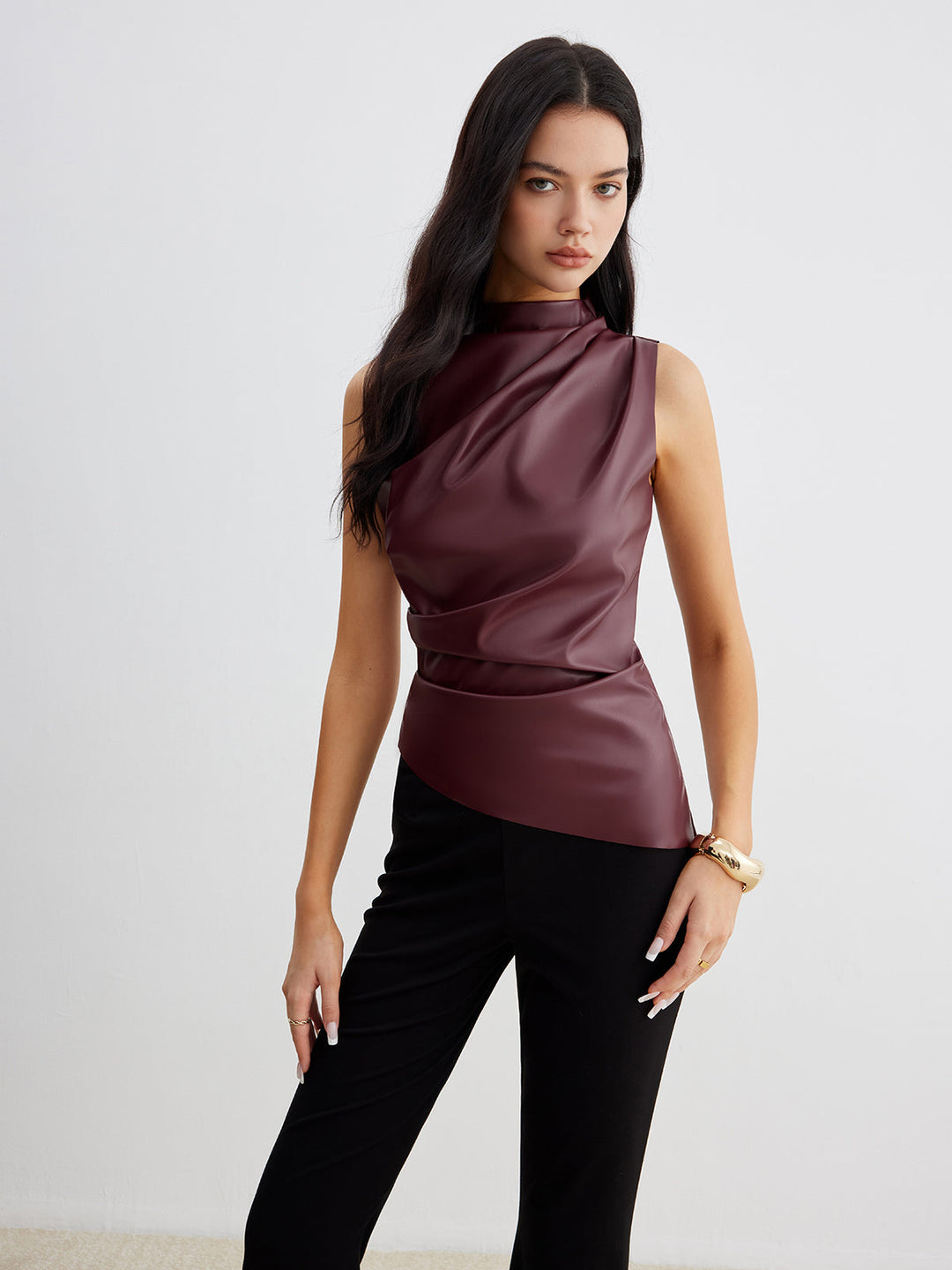 Stylish women's high neck sleeveless blouse, ideal for versatile summer fashion.