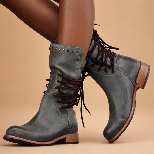 Elegant black slip-on ankle boots for women, offering fashion-forward design and comfortable wear.