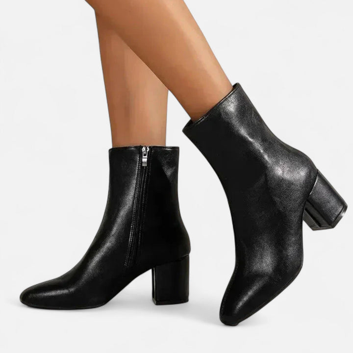 Everyday elegance with these chic women's ankle boots, featuring a comfortable block heel for fall and winter style.