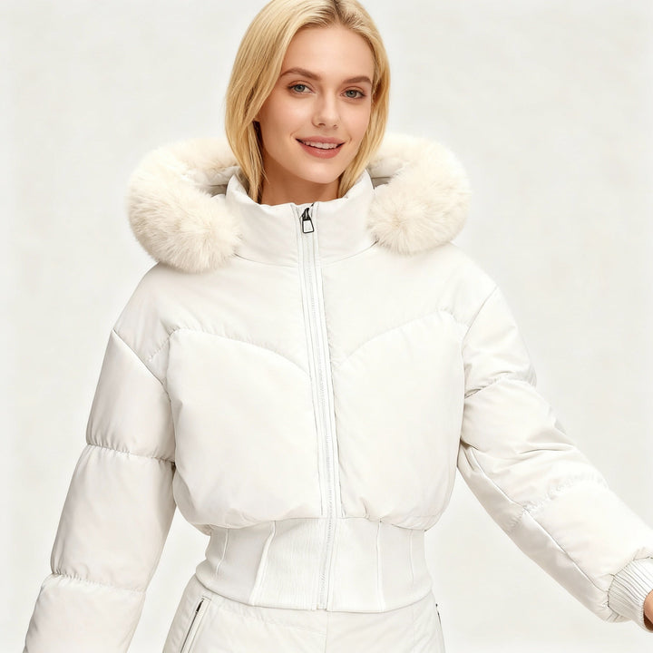 Fashionable women's cropped winter outerwear, featuring a plush faux fur hood for ultimate warmth and style.