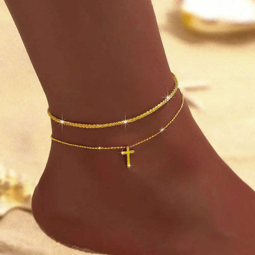 Elegant women's silver & gold ankle bracelet. Delicate double chain design, perfect fashion jewelry accessory.
