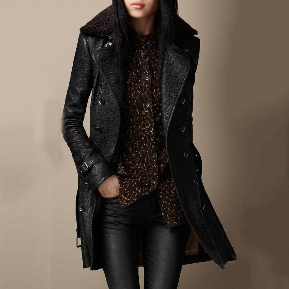 Chic women's double-breasted faux leather coat, black, featuring a stylish design perfect for trendy winter outerwear.