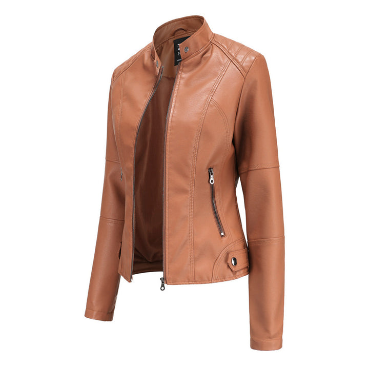 Close-up of a women's chic faux leather jacket texture, showcasing its quality and style.