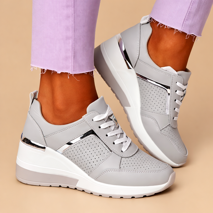 Chic women's lace-up sneakers offering all-day comfort & modern style. Perfect for casual everyday wear.