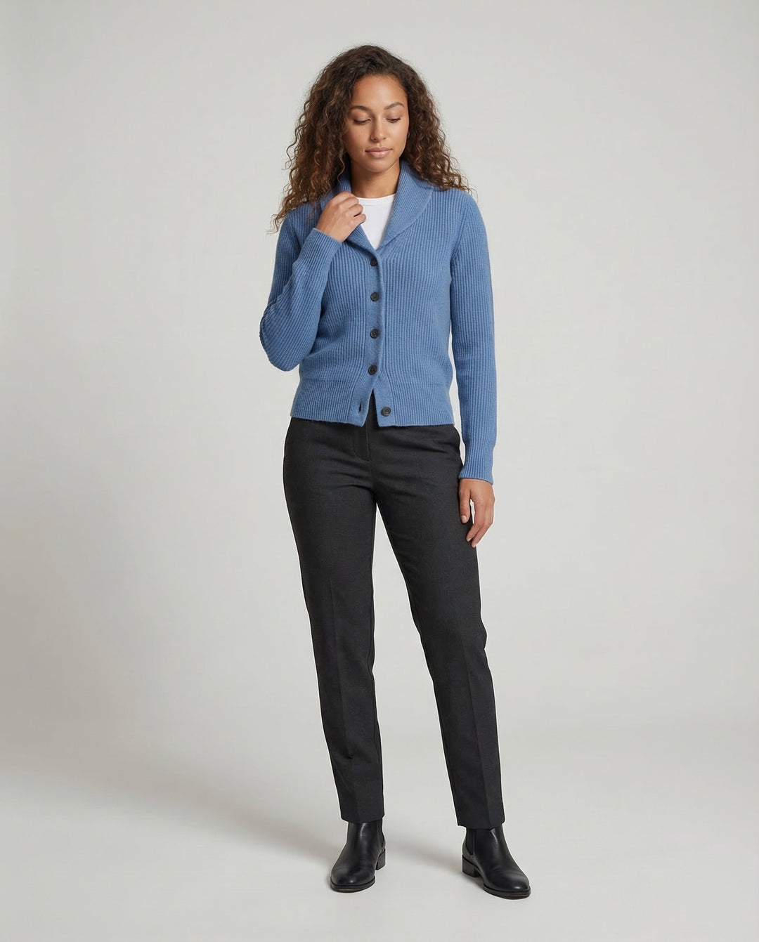 Chic women's lapel collar button-front cardigan. Versatile long sleeve knit for office or casual layering.
