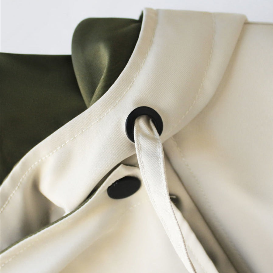 Autumn fashion: women's chic waterproof windbreaker jacket with zipper closure and hood