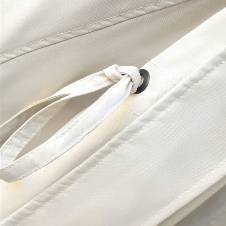 Detail of the waterproof zipper on a women's lightweight windbreaker jacket, ensuring dryness