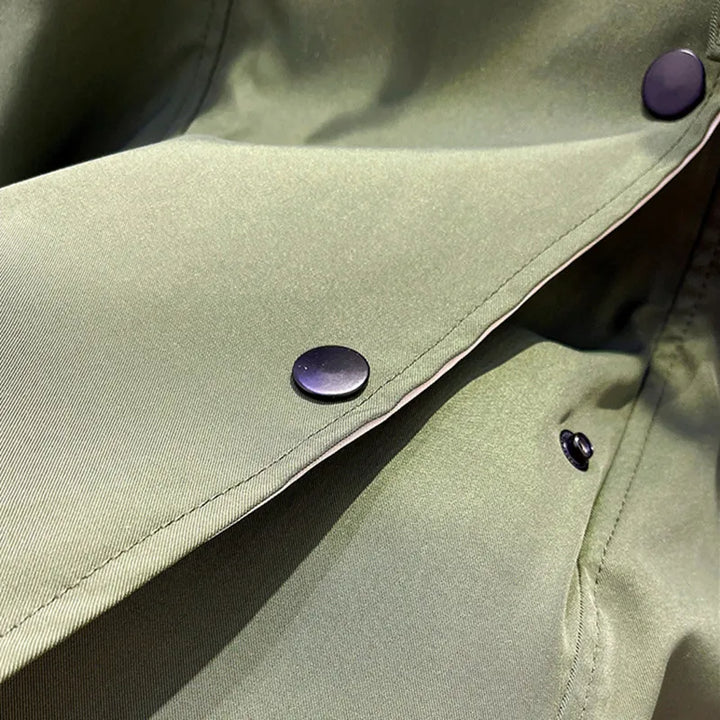 Lightweight women's rain jacket in neutral tone, perfect for travel and everyday autumn wear
