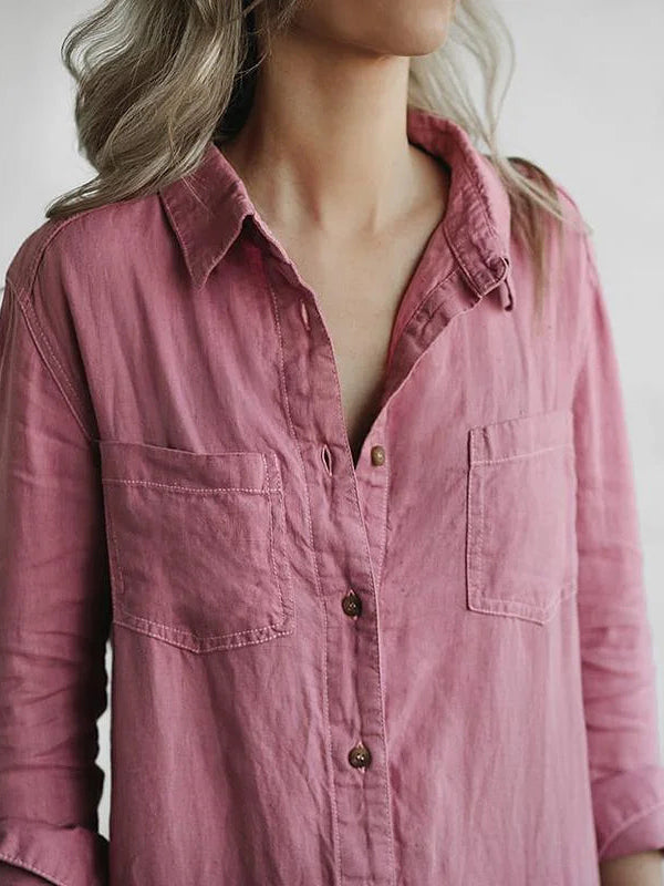 Black women's long sleeve button-up jumpsuit. Elegant and comfortable everyday wear.