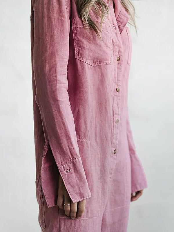 Detail of buttons on a long sleeve women's jumpsuit, showcasing chic button-up style.