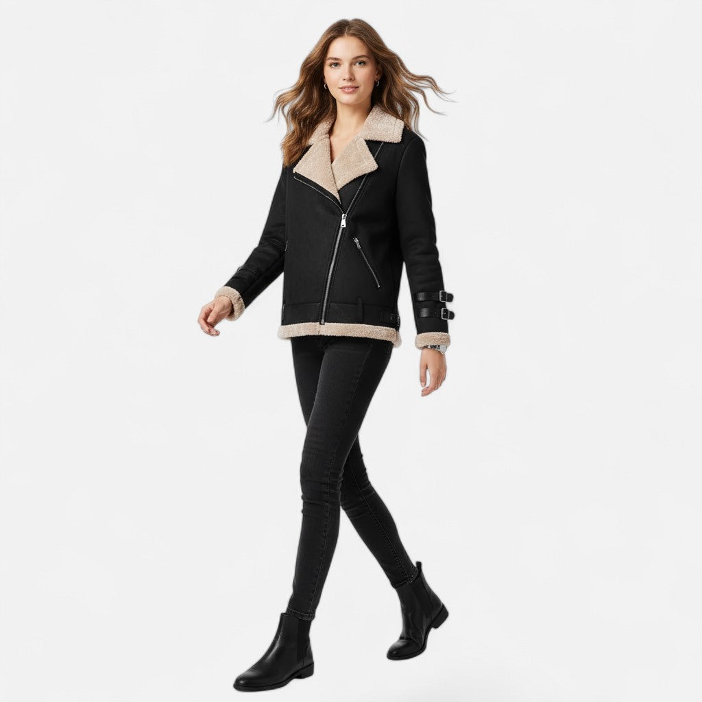 Stylish women's moto coat featuring a stand-up collar & asymmetric zip, offering chic winter fashion.