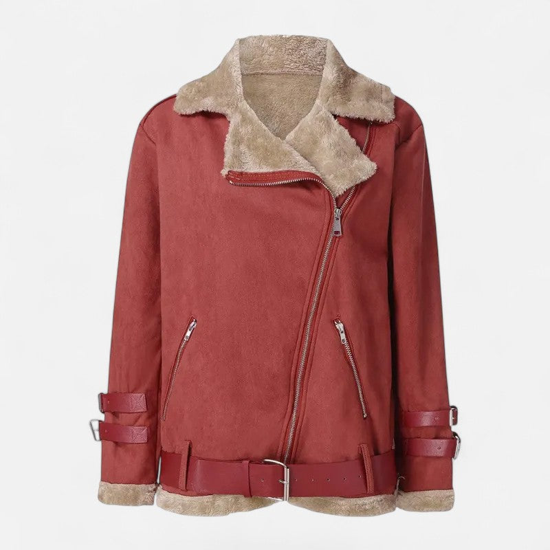 Woman in a chic moto coat, exuding confident style for autumn & winter. Elegant and warm outerwear.