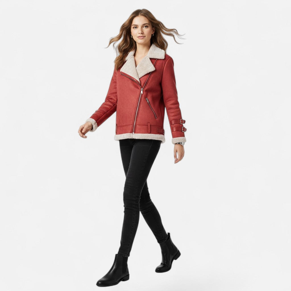 Versatile women's moto coat, worn open to reveal elegant layering. Perfect for autumn & winter fashion.