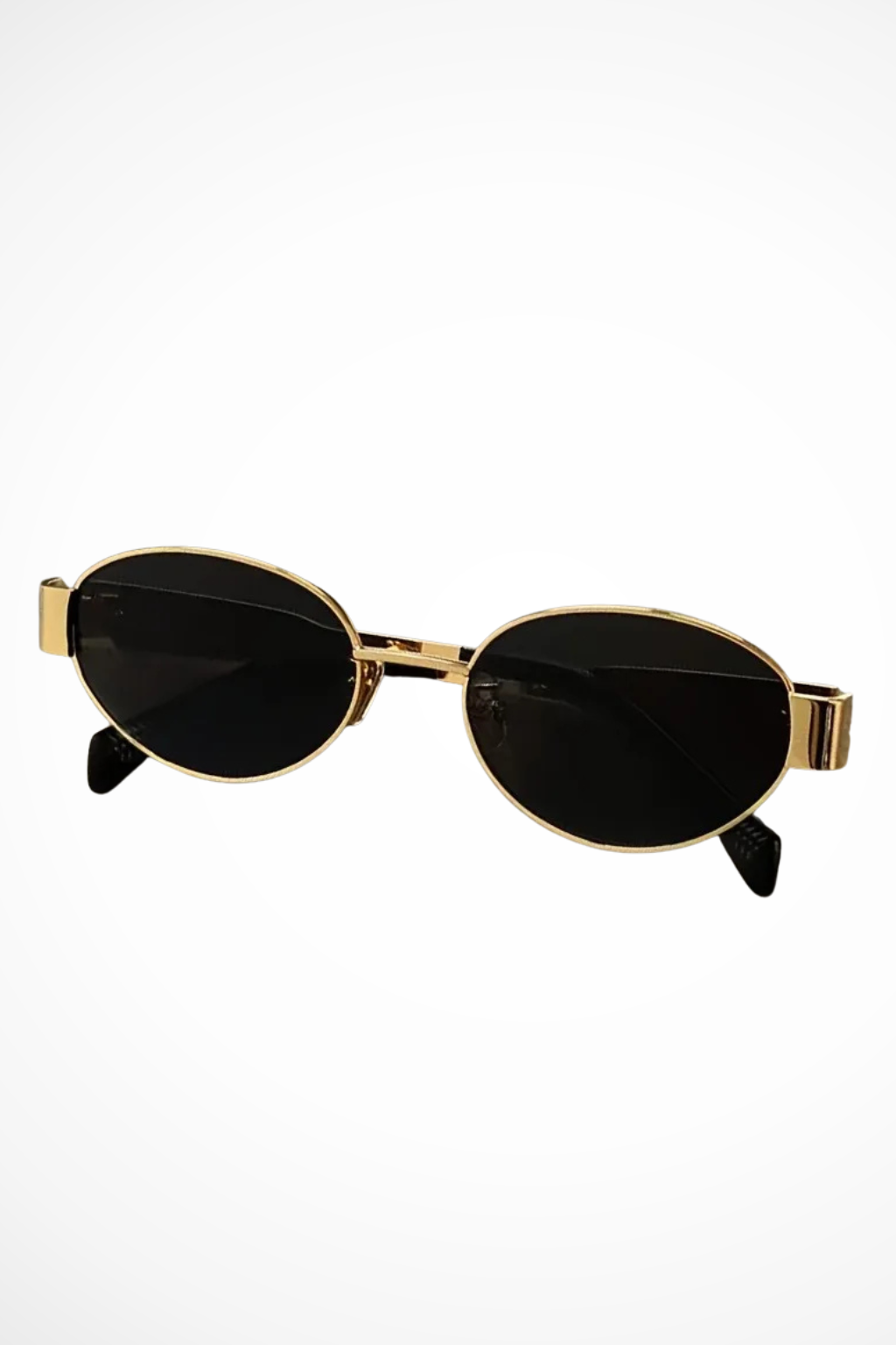Women's protective oval sunglasses with a metallic frame and tinted lenses. A trendy fashion accessory.
