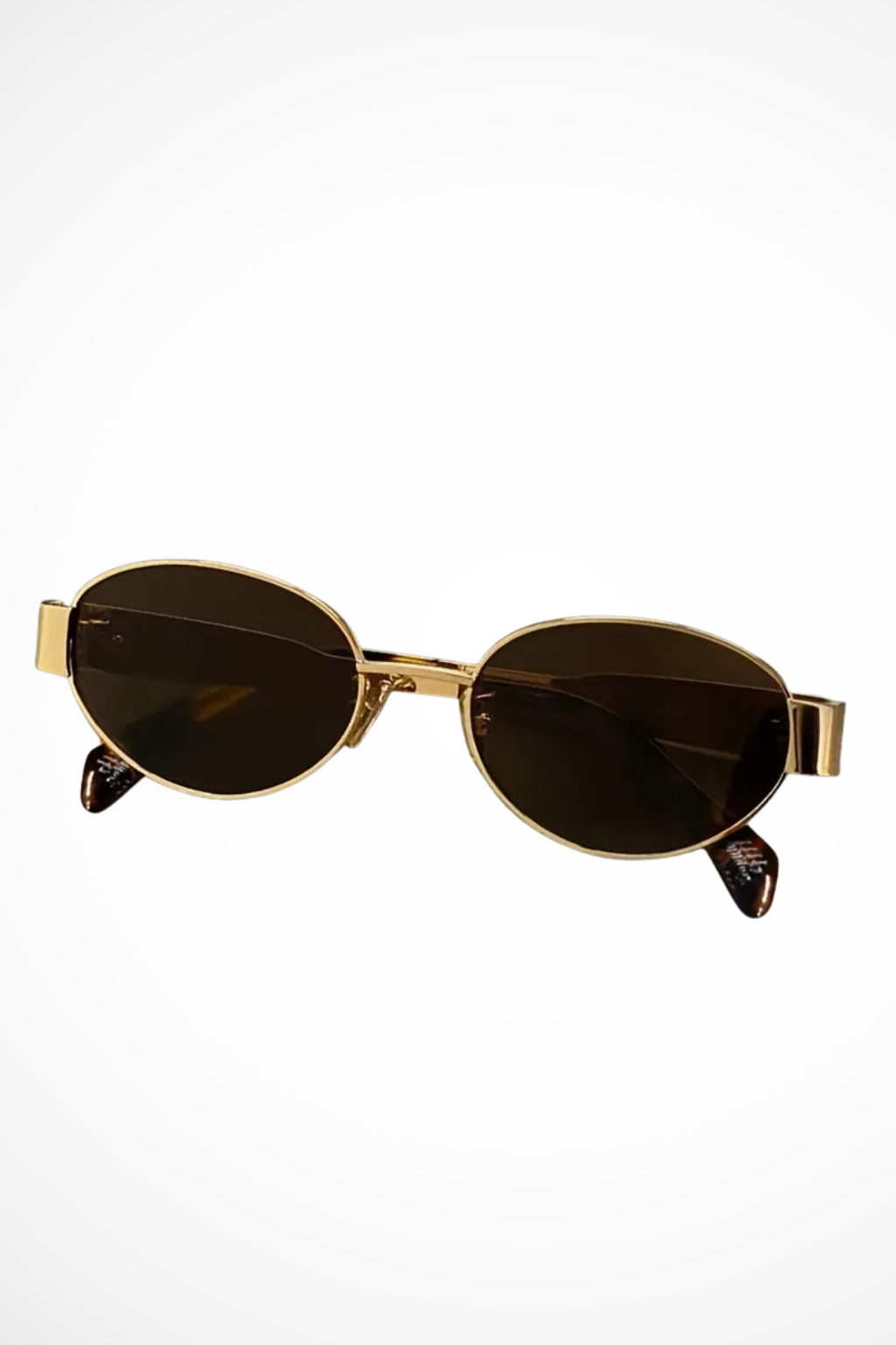 Women's oval metal frame sunglasses with dark tinted lenses. A sleek, protective and fashionable accessory.