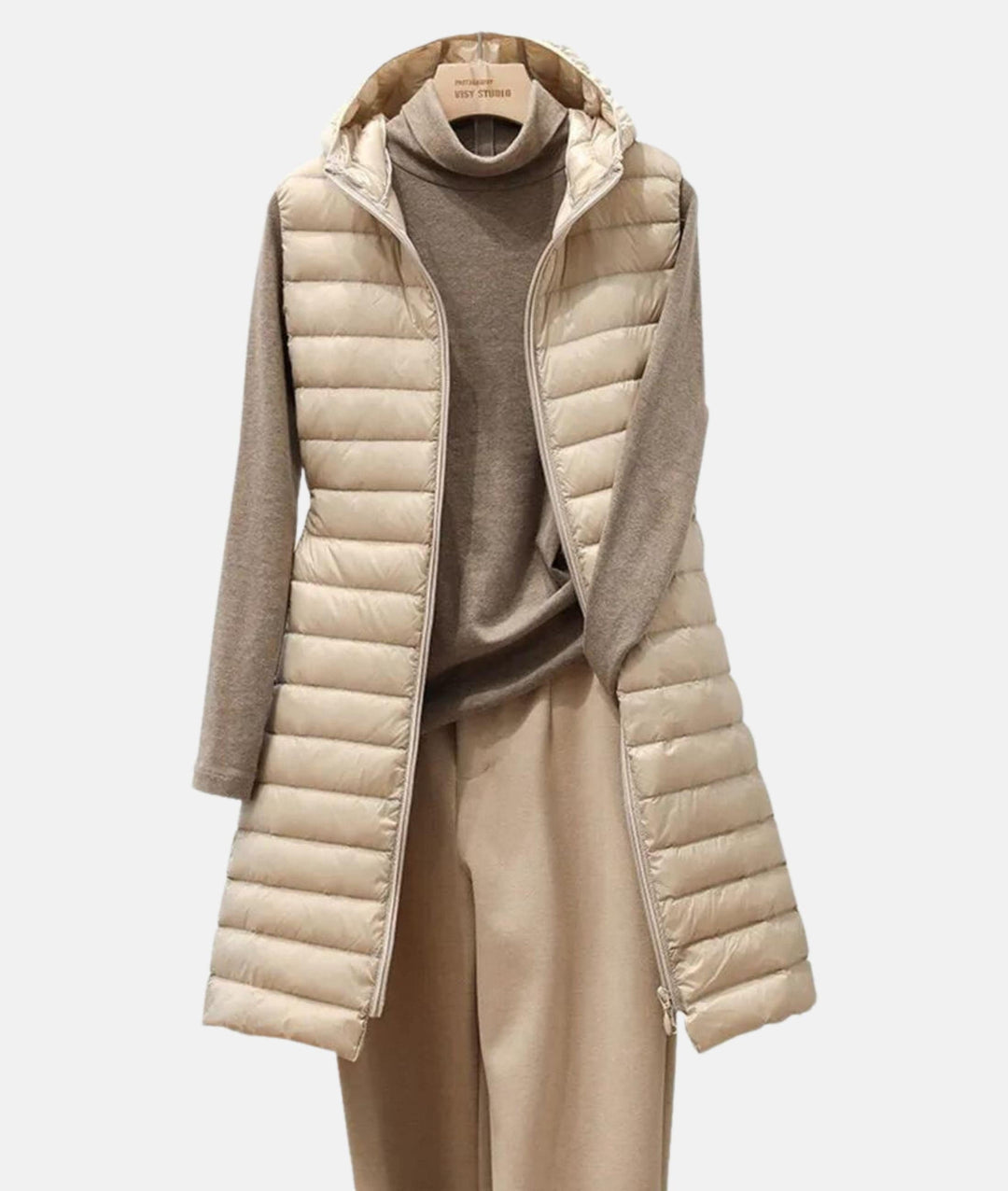 Cozy women's quilted long jacket for winter & fall. Lightweight, chic, slim-fit design with a convenient full zip.