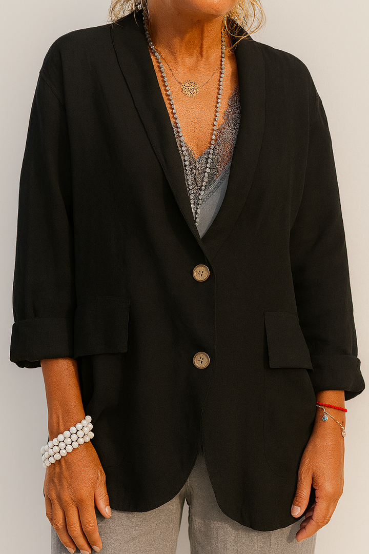 Versatile women's layering blazer jacket with elegant button detail. Ideal for spring casual or office wear.