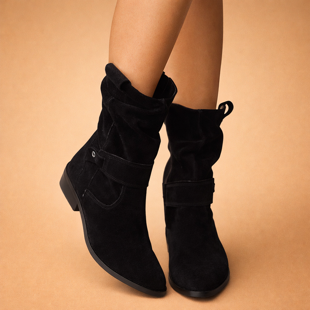 Women's elegant slouch winter ankle boots with chic buckle detail. Fashionable and warm winter footwear.