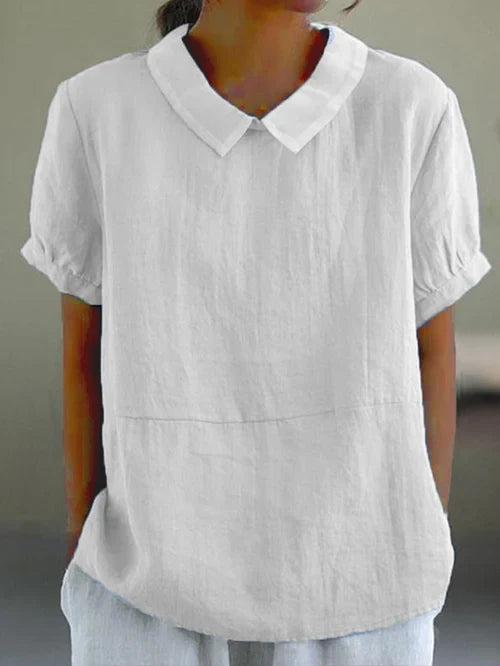 Versatile solid color women's top, loose fit & round neck. Ideal for everyday comfort & chic casual wear.