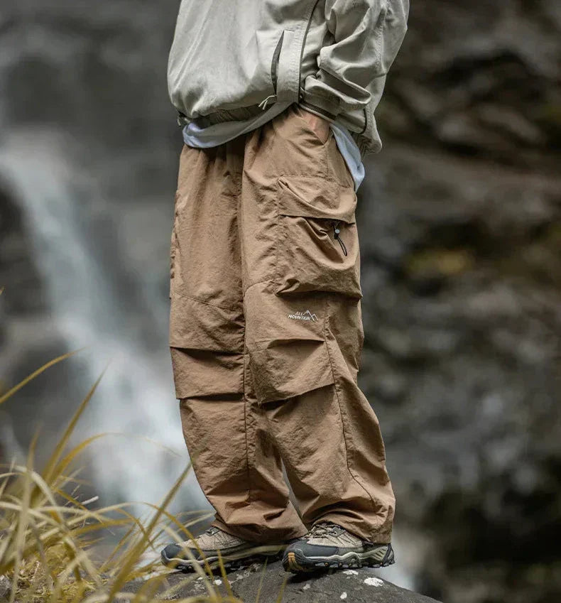 Water beading on women's waterproof pants, showcasing their effective all-weather protection.