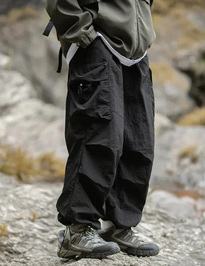 Side view of women's comfortable waterproof pants, highlighting the flattering silhouette and modern cut.