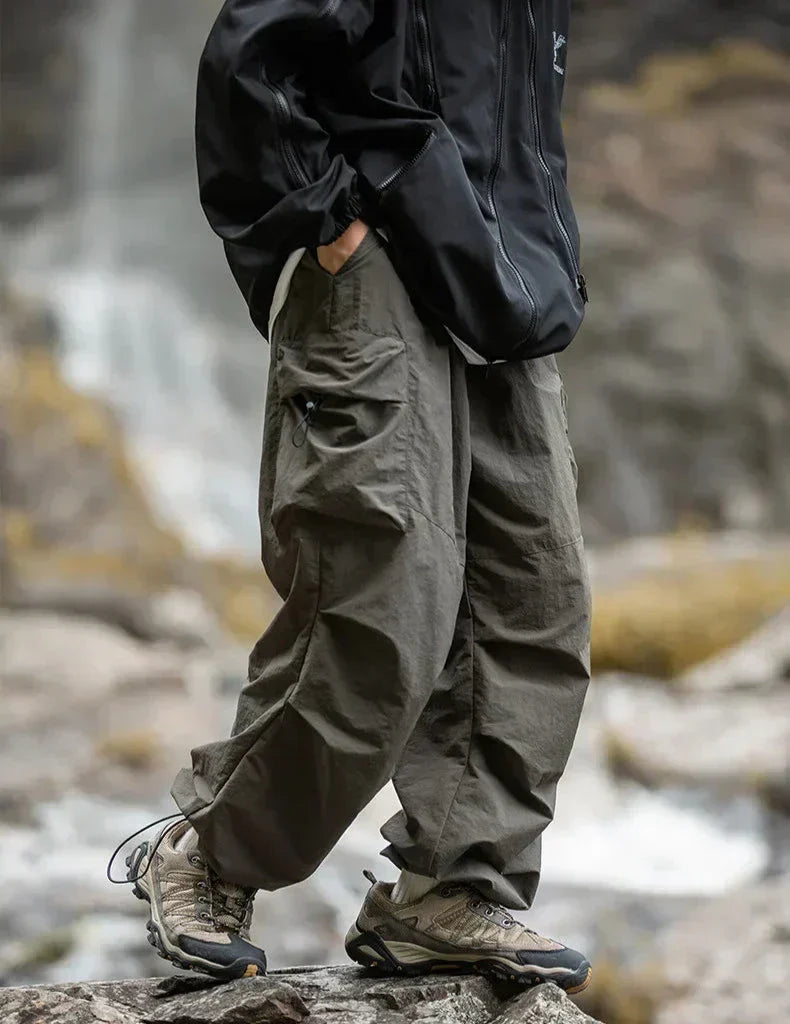 Detail of the chic waistband and secure closure on comfortable women's waterproof trousers.