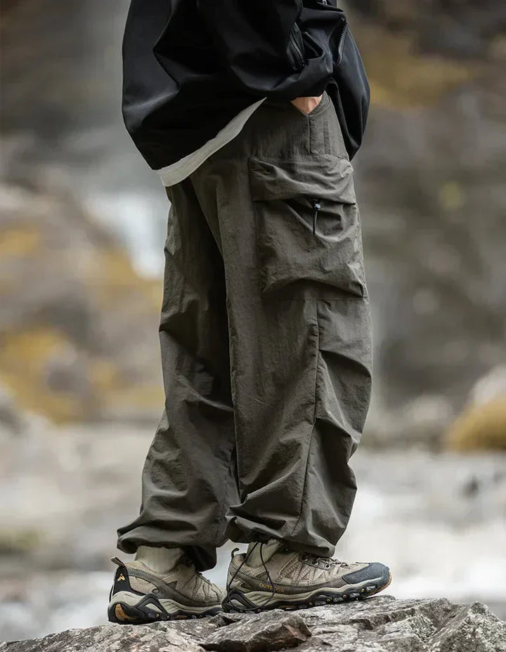 Functional pockets on stylish women's waterproof pants, combining utility with a chic look.