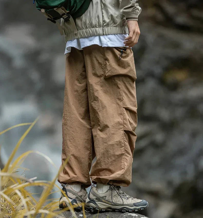 Woman confidently walking in comfortable, waterproof women's trousers, ideal for active lifestyles.