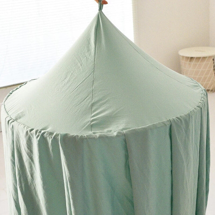 Sensory-friendly blackout canopy, provides a calming, dark space for children's sleep & play.