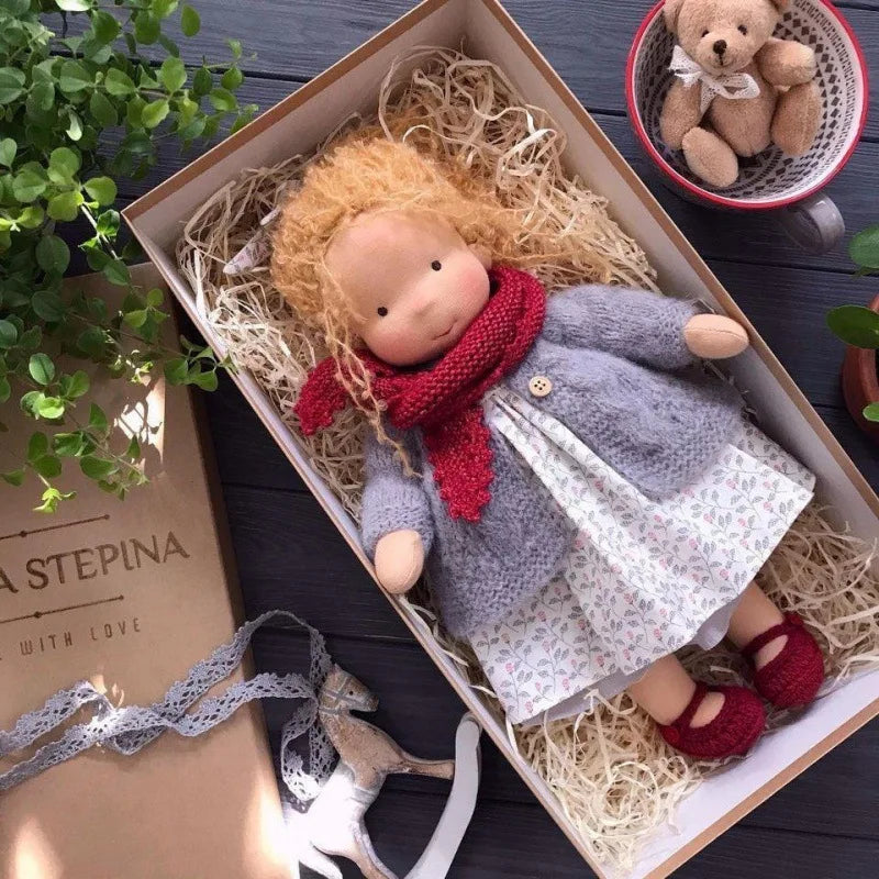 Soft cotton handmade Waldorf doll, plush, a sweet addition to kids' decor.