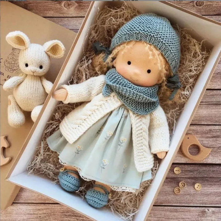 Handmade soft cotton Waldorf doll, plush, for children's room decor.