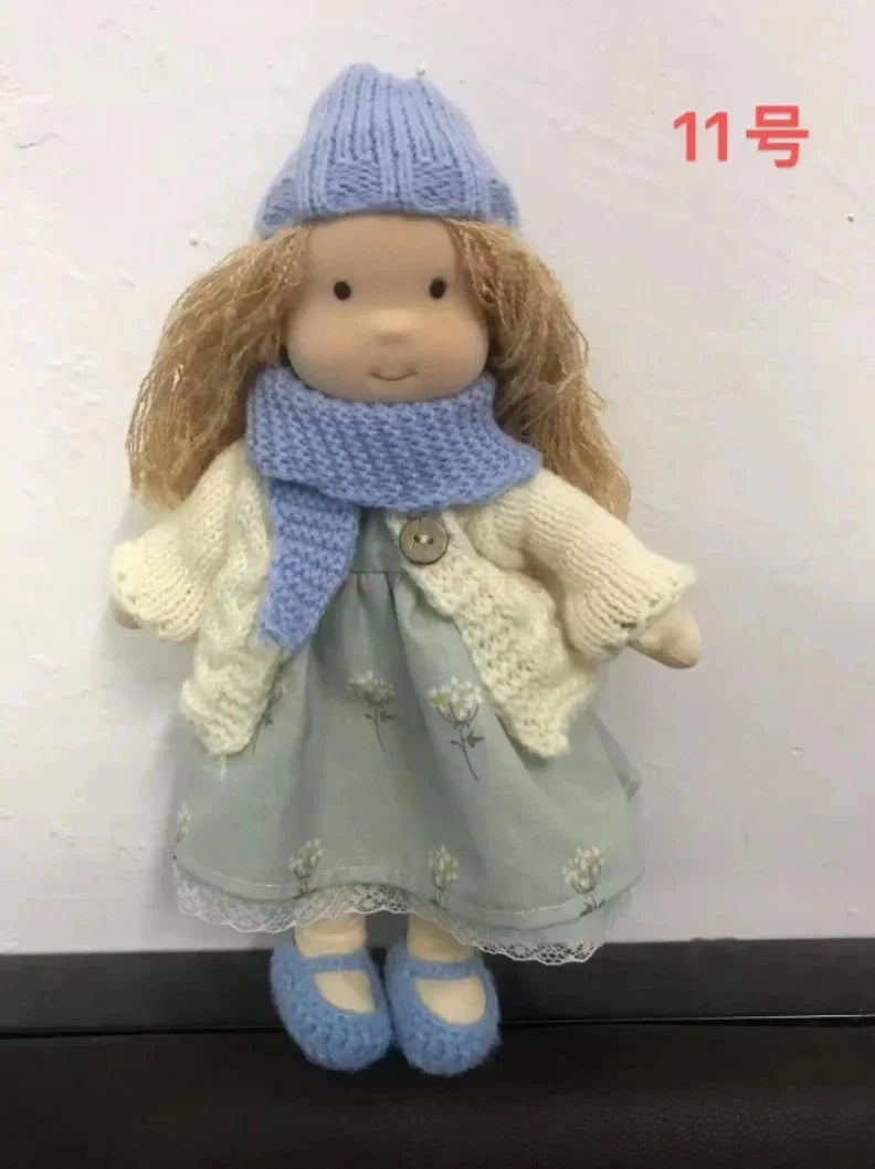 Soft cotton plush Waldorf doll, handmade, perfect for nurturing play.