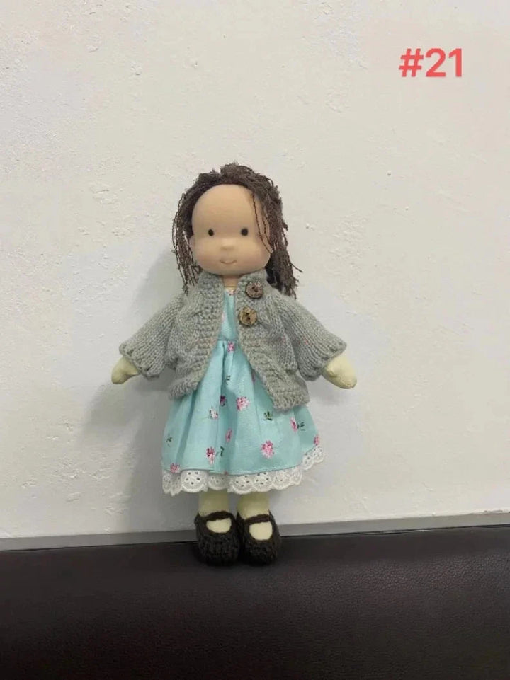 Kids' handmade Waldorf doll with fabric box, charming addition to room decor.