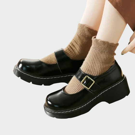 Classic black leather Mary Jane block heel shoes, elegant women's dress footwear with strap detail