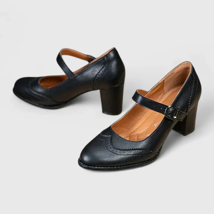 Stylish Mary Jane heel pumps in black, featuring a classic buckle, essential women's spring and work shoes.
