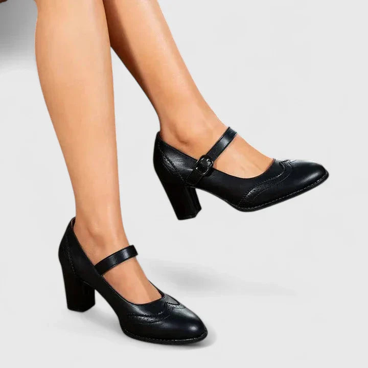 Women's classic Mary Jane heels in black, featuring a buckle strap, ideal for summer shoes.