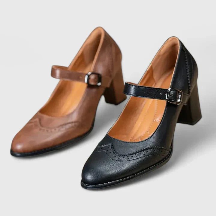 Comfortable women's Mary Jane heel pumps, black with an adjustable buckle strap, vintage style.
