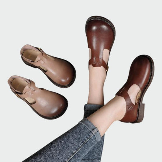 Classic black T-bar Mary Jane shoes for women with a block heel, comfortable fashion footwear.