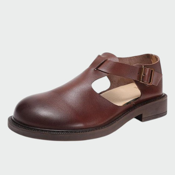 Versatile women's T-bar Mary Jane shoes with a modest block heel, essential classic footwear.