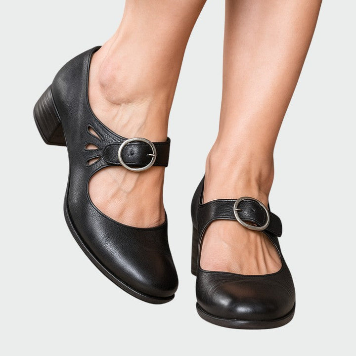 Classic buckle Mary Jane shoes for women, black leather flats with comfortable block heel, everyday wear.