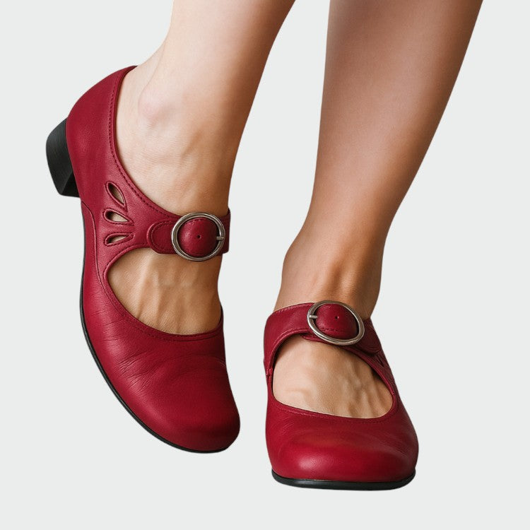 Comfortable black women's flats, classic buckle Mary Jane design with a sturdy block heel.