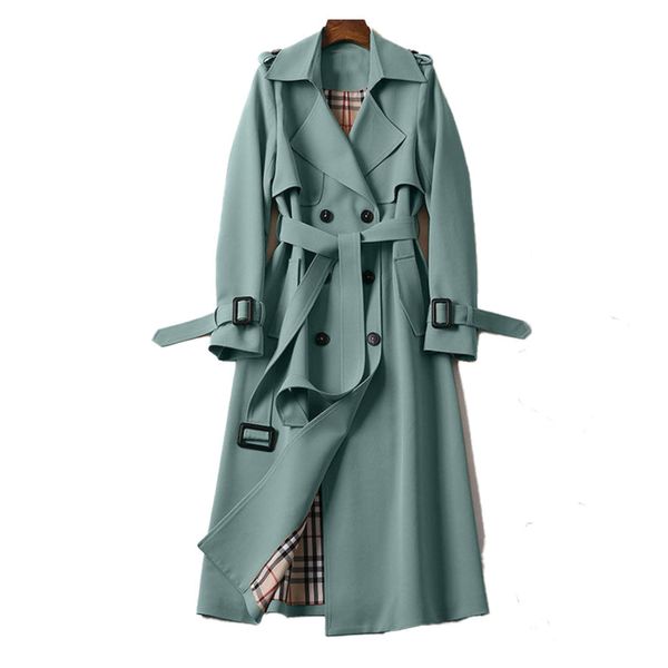 Sophisticated blue belted trench coat for women, a timeless autumn jacket.