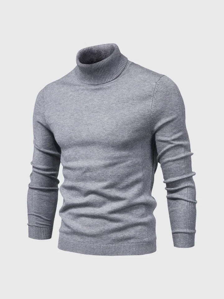 Wardrobe staple men's turtleneck sweater. Versatile, long sleeve, soft knit for comfort and style.