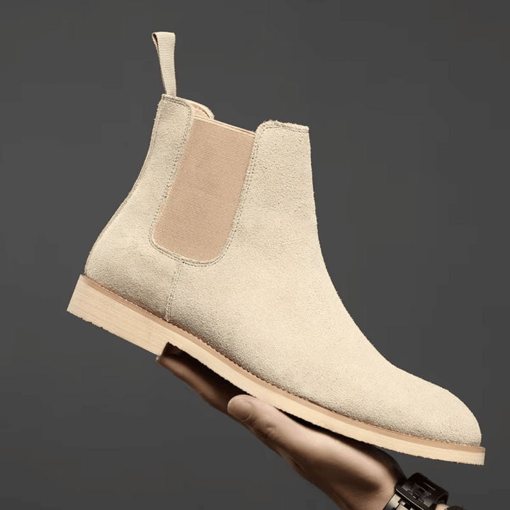 Classic men's brown leather Chelsea boots, perfect for casual & smart-casual outfits.