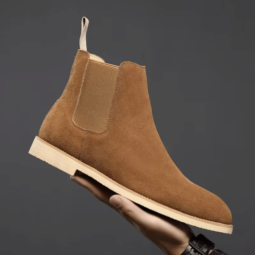 Stylish men's ankle boots, versatile for smart-casual & everyday wear. Classic Chelsea design.