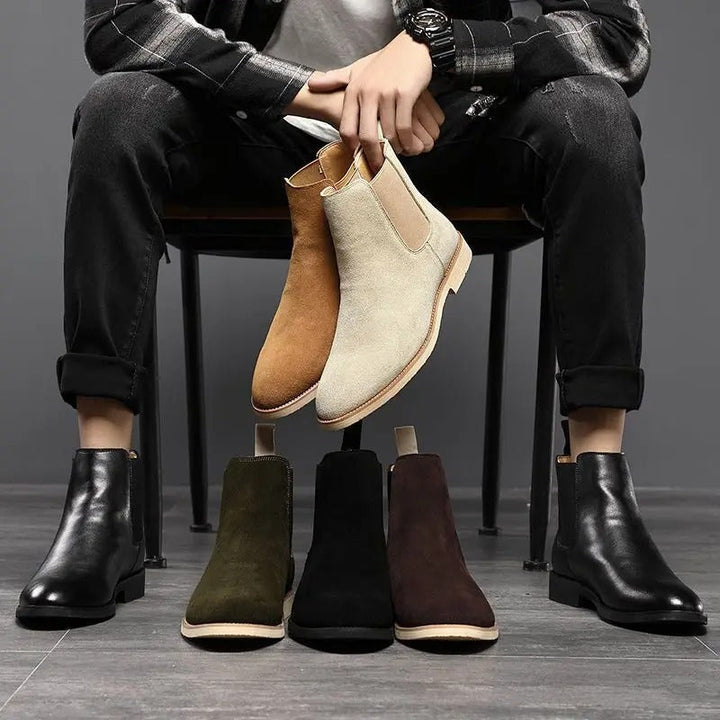 Durable brown leather men's Chelsea boots, slip-on ankle style for versatile casual & smart-casual looks.