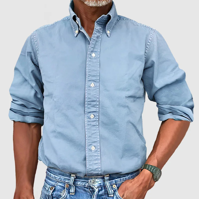 Smart men's collared button-down, long-sleeve, essential for a business casual or classic casual wardrobe.