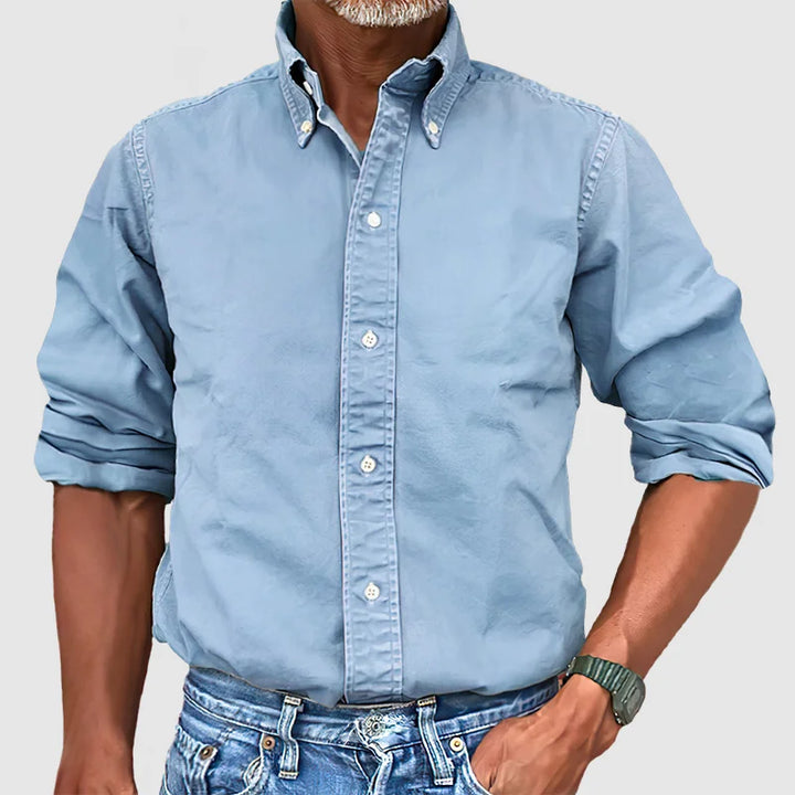 Smart men's collared button-down, long-sleeve, essential for a business casual or classic casual wardrobe.
