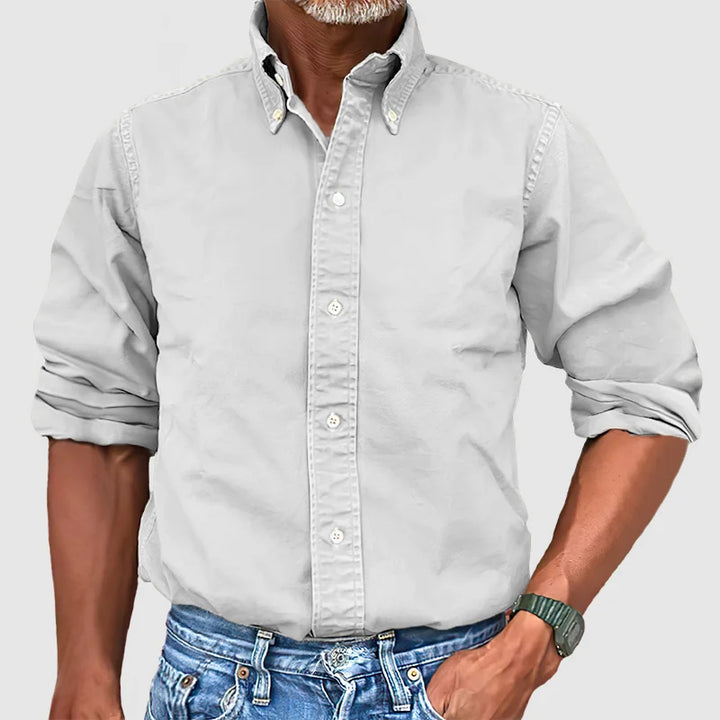 Versatile men's button-down shirt, long sleeves, great for casual wear or dressed up for events.